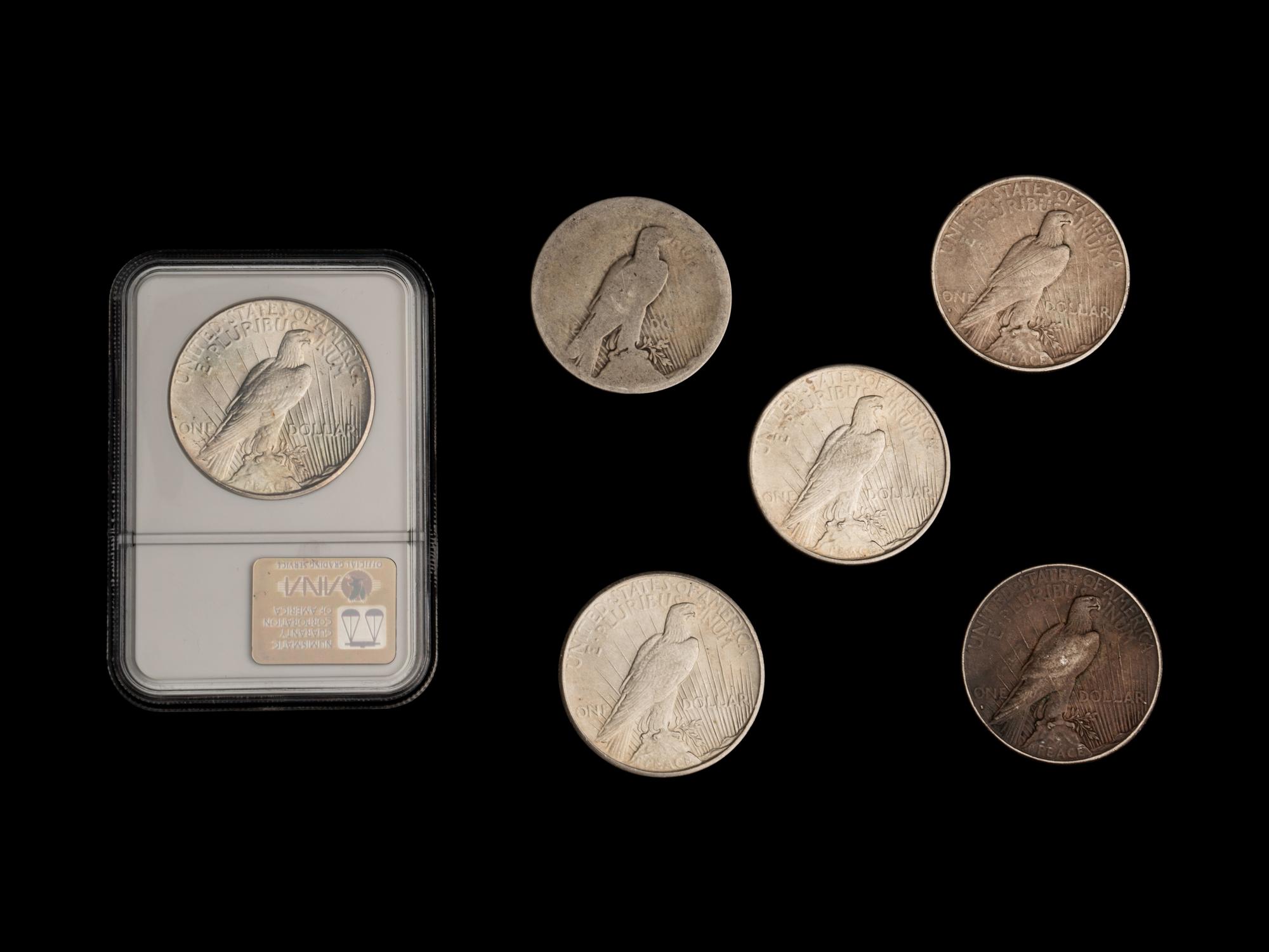 A Large Collection of One Hundred and Thirty-Nine Peace $1 Coins