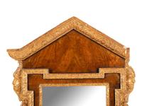 A George II Parcel Gilt Walnut Mirror
