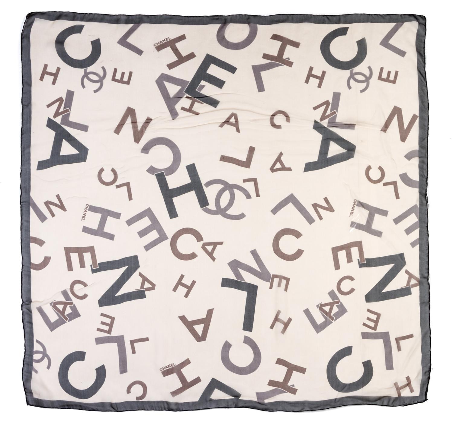 A Chanel Silk Chiffon Print Scarf, 38 x 38 inches.