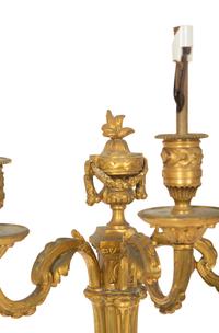 A Pair of Louis XVI Style Gilt Bronze Three-Light Wall Sconces