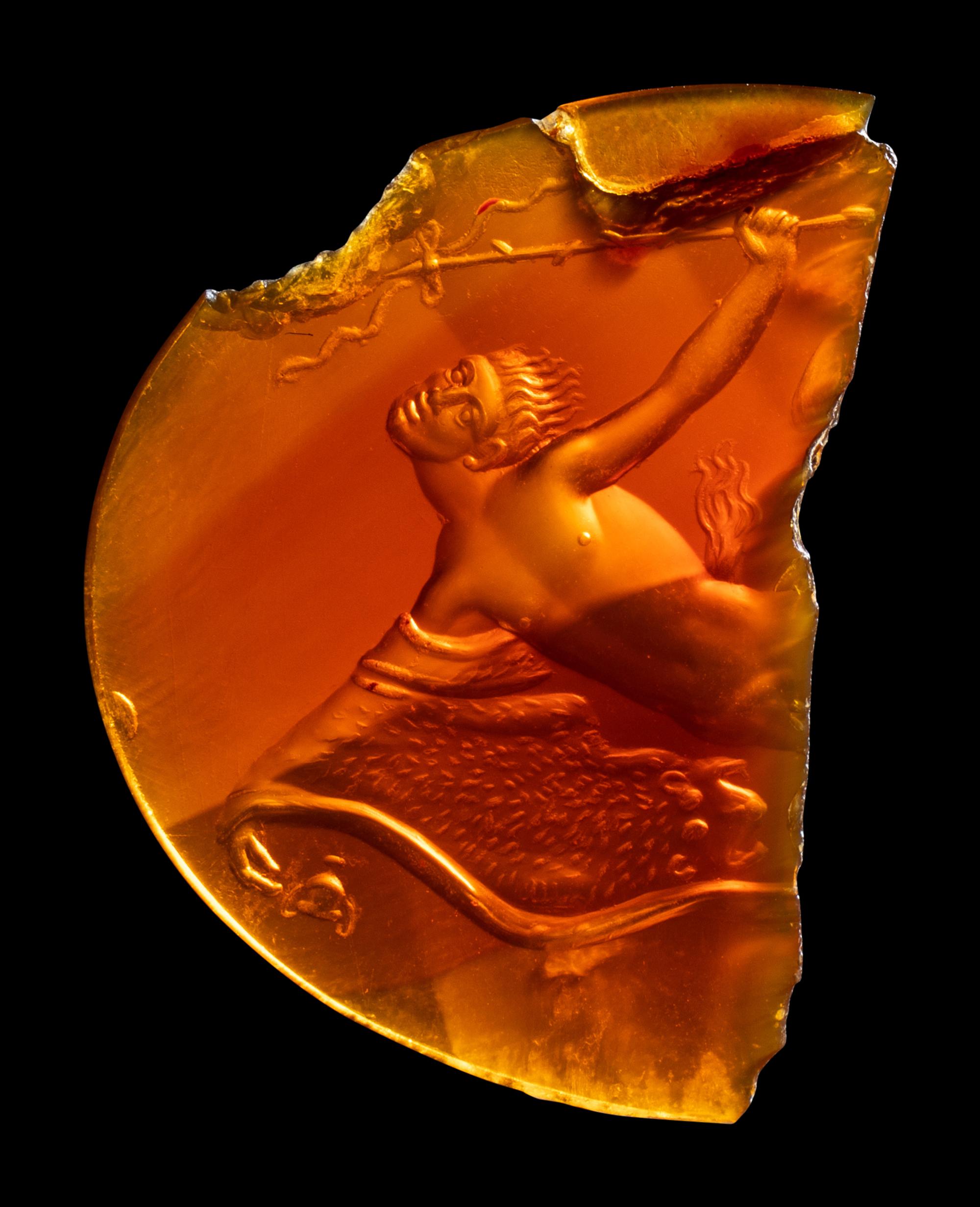 A Roman Carnelian Intaglio Fragment with a Dancing Satyr with the Bacchic Fury