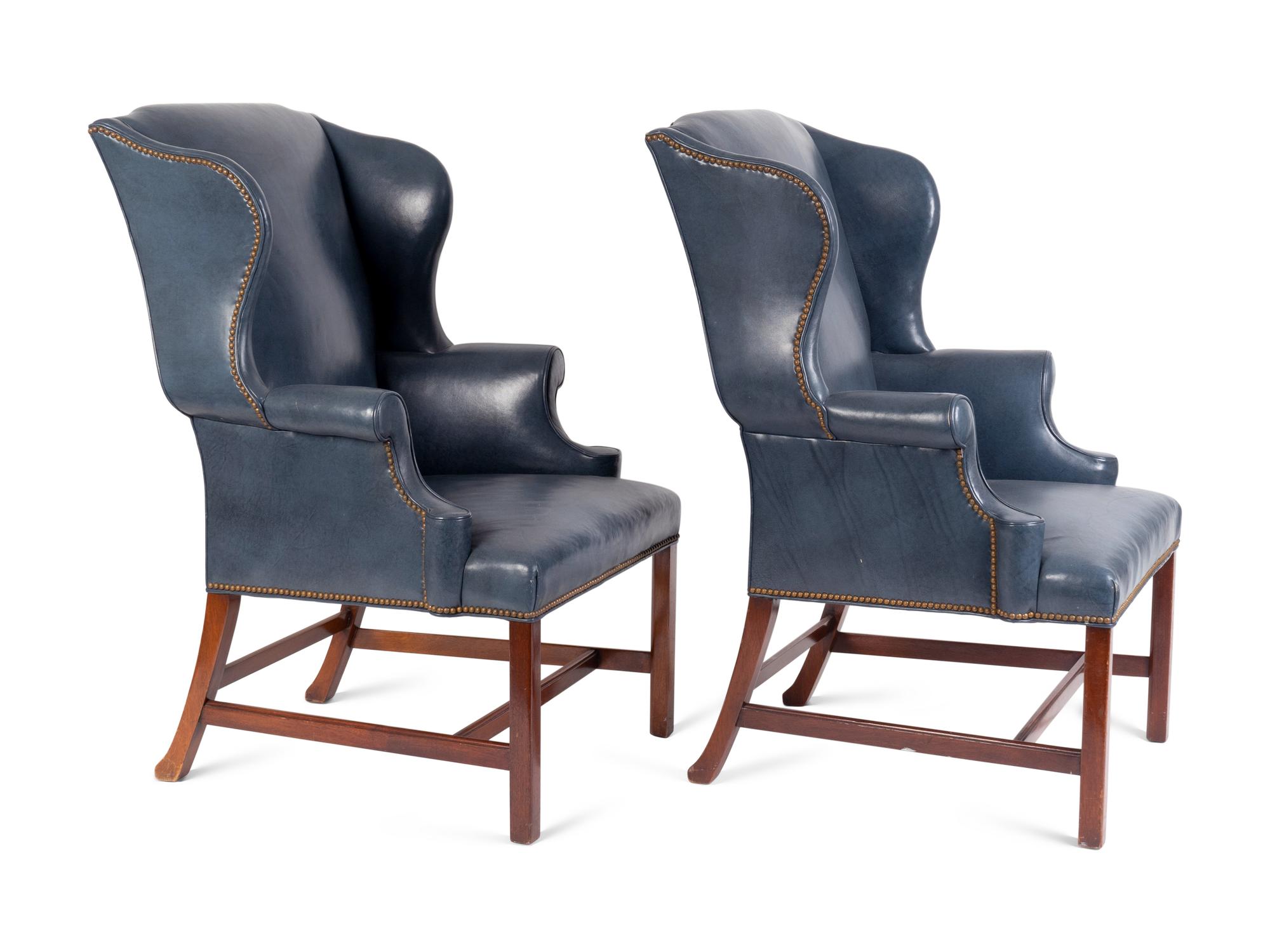 A Pair of George II Style Leather Upholstered Wingback Chairs — 19TH CENTURY