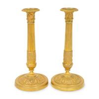 A Pair of French Neoclassical Gilt Bronze Candlesticks