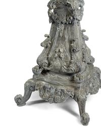 A Pair of Monumental Italian Carved and Faux Marble Painted Urns on Stands