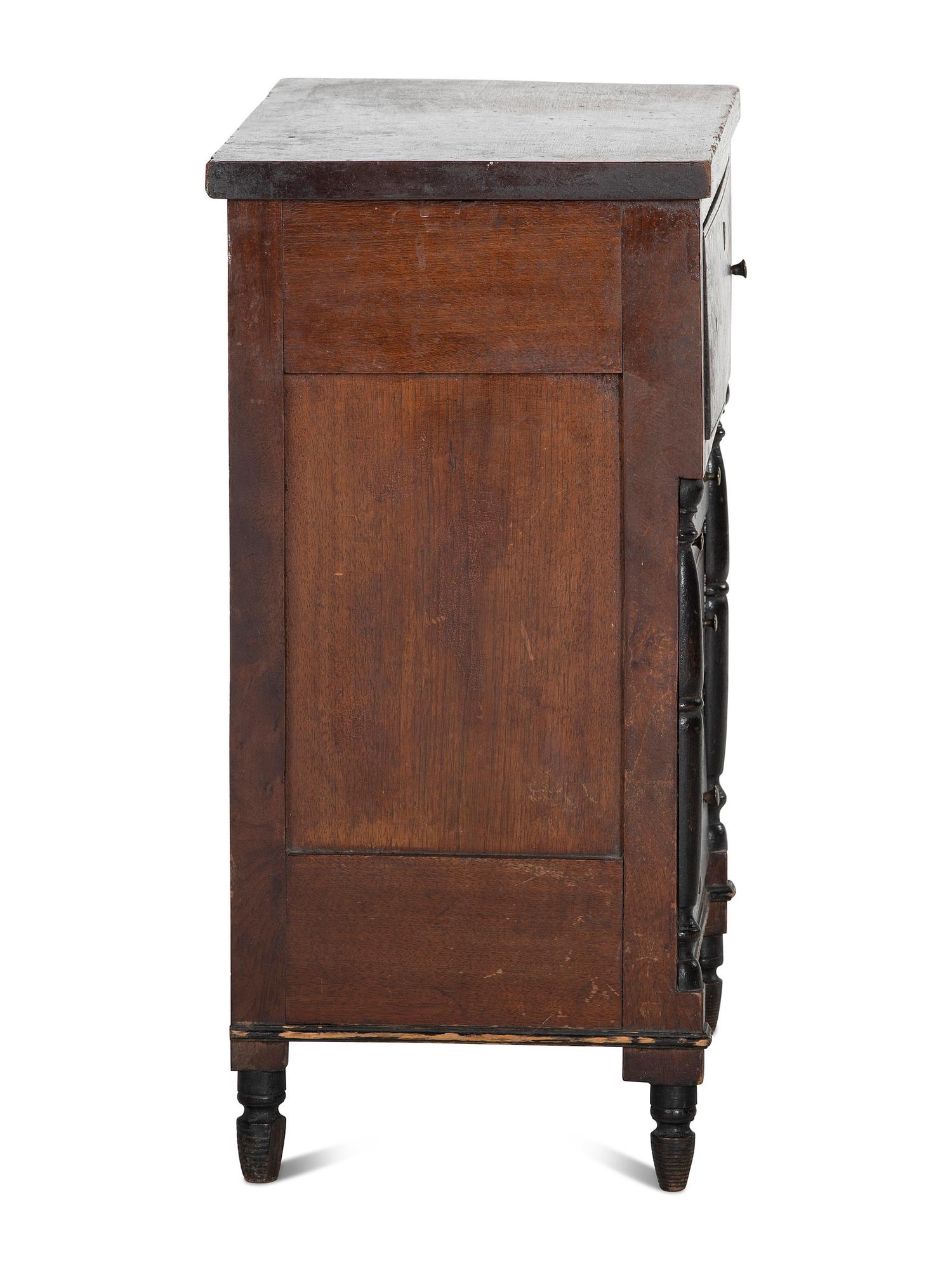A Late Federal Parcel Ebonized Walnut Diminutive Child's Chest of Drawers