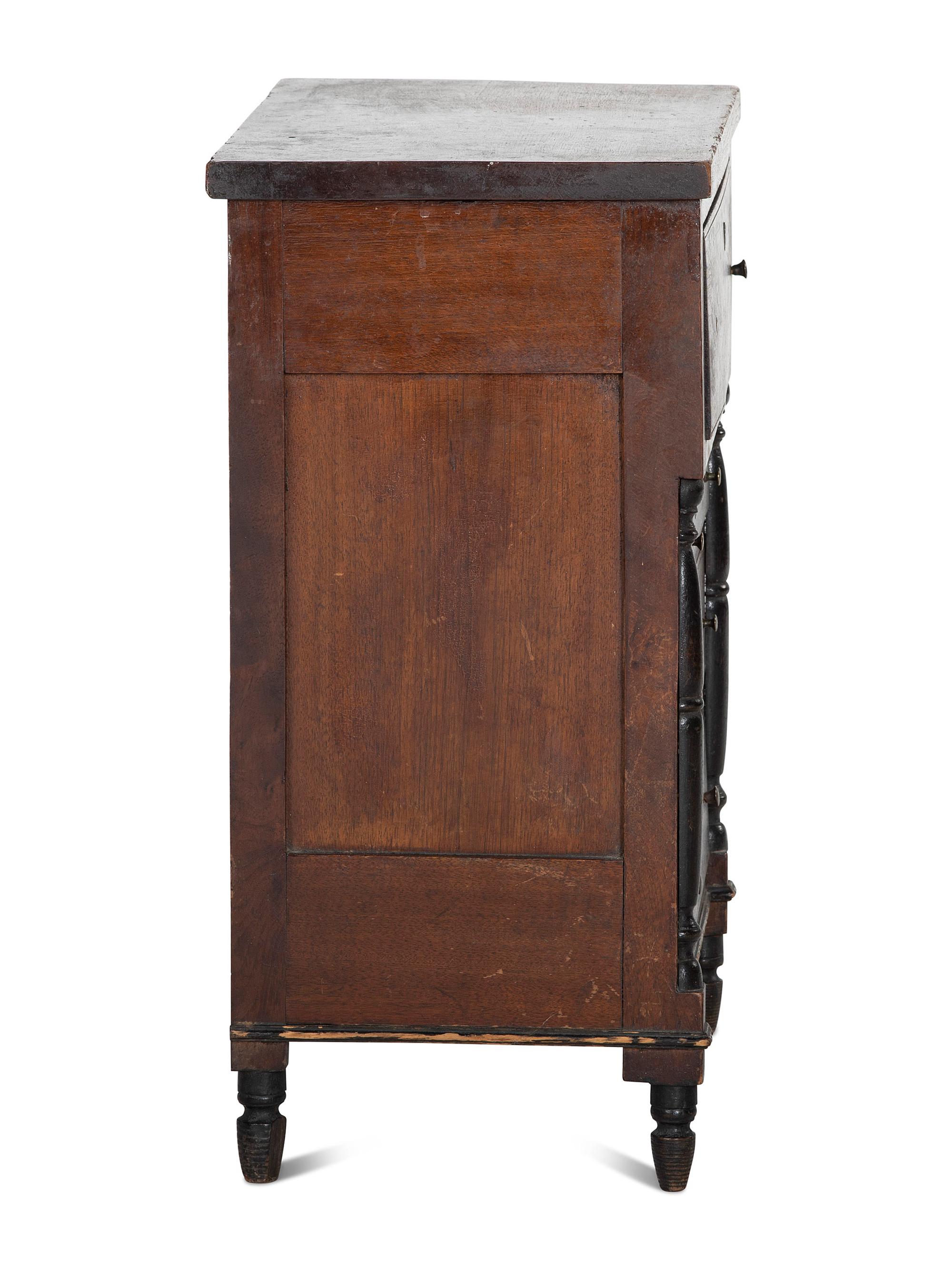 A Late Federal Parcel Ebonized Walnut Diminutive Child's Chest of Drawers