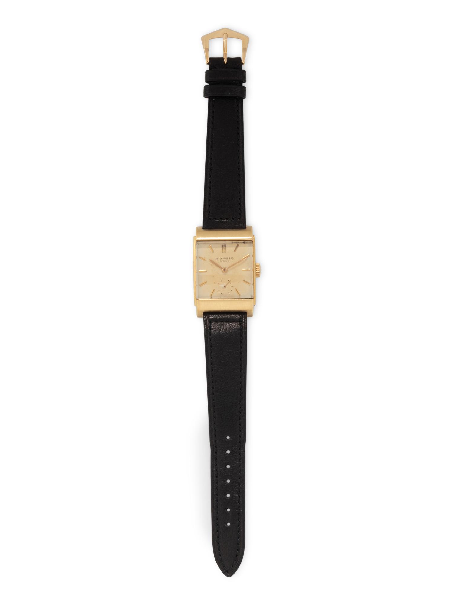 PATEK PHILIPPE, REF. 2479 18K YELLOW GOLD 'CURVED DOME RECTANGULAR' WATCH, WITH EXTRACT FROM THE ARCHIVES