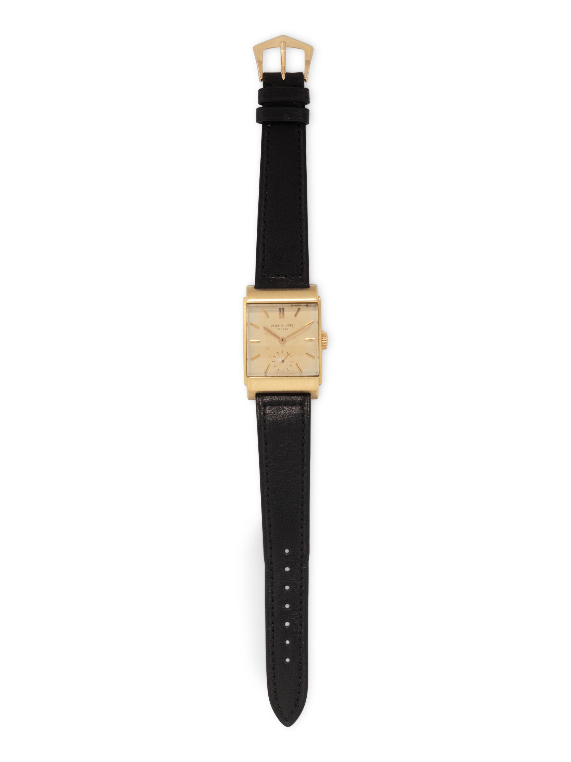 PATEK PHILIPPE, REF. 2479 18K YELLOW GOLD 'CURVED DOME RECTANGULAR' WATCH, WITH EXTRACT FROM THE ARCHIVES