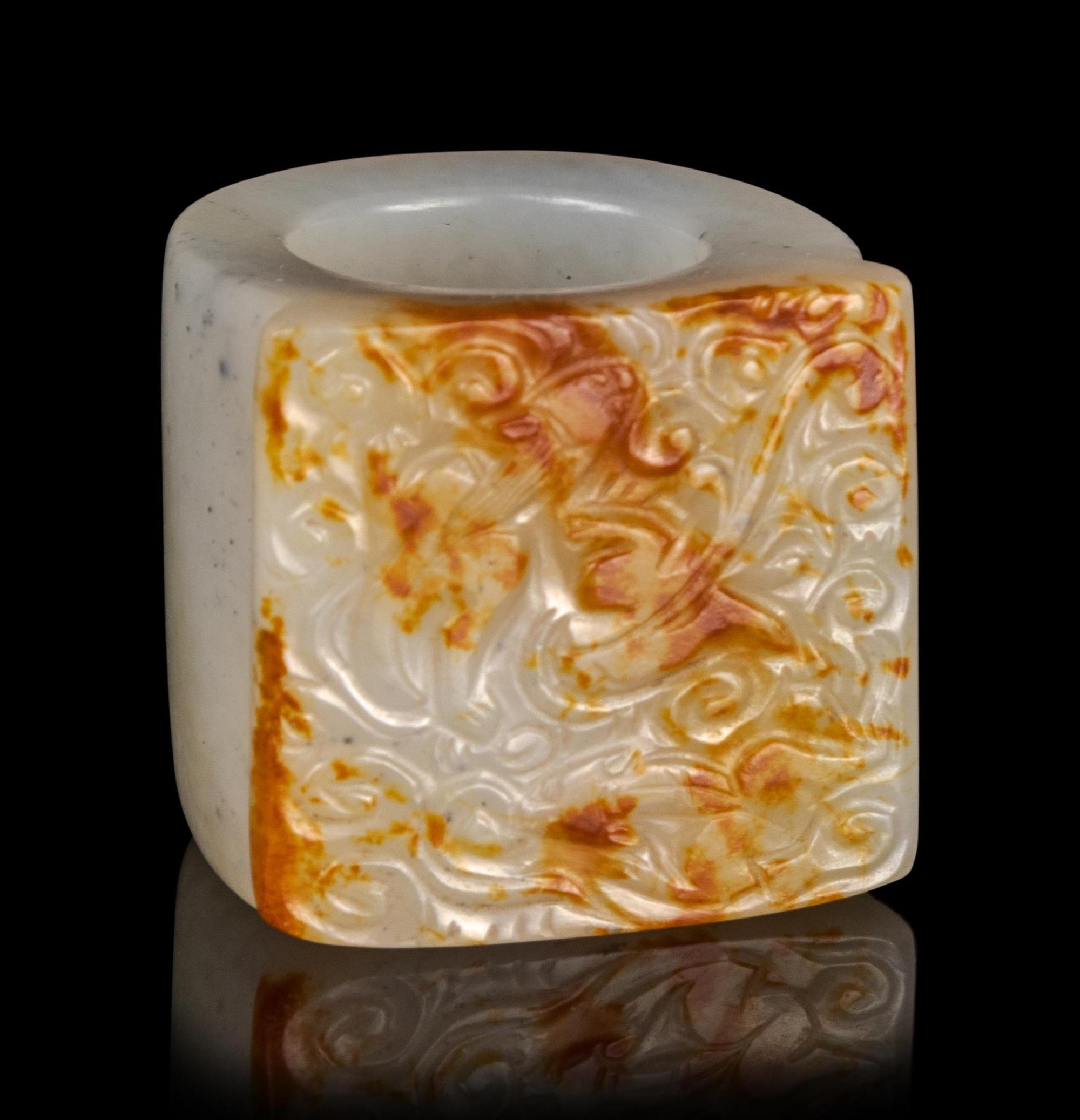 A Russet and White Jade Archer's Ring