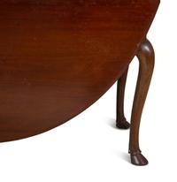 An George III Style Mahogany Drop Leaf Oval Dining Table