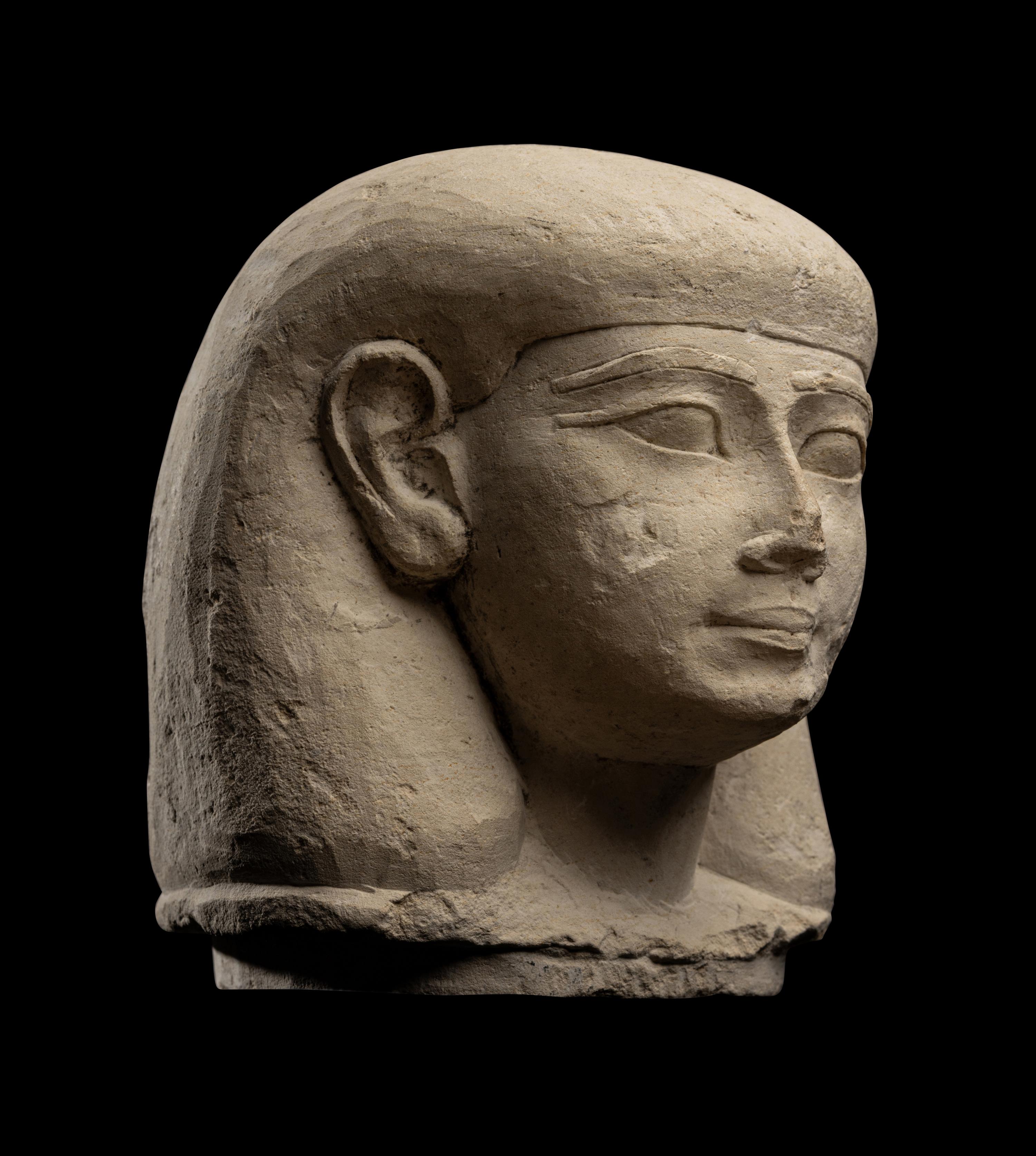 An Egyptian Limestone Canopic Jar Lid for Imseti