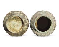 A pair of patinated bronze archaistic large vases