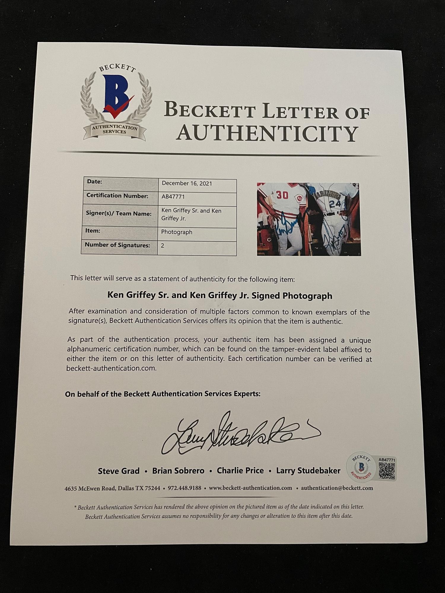 A Ken Griffey Jr. and Ken Griffey Sr. Signed Autograph Griffey The Next Generation Photograph With Period Signatures (Beckett Authentication Services Letter BAS Certified),