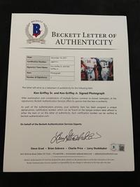A Ken Griffey Jr. and Ken Griffey Sr. Signed Autograph Griffey The Next Generation Photograph With Period Signatures (Beckett Authentication Services Letter BAS Certified),