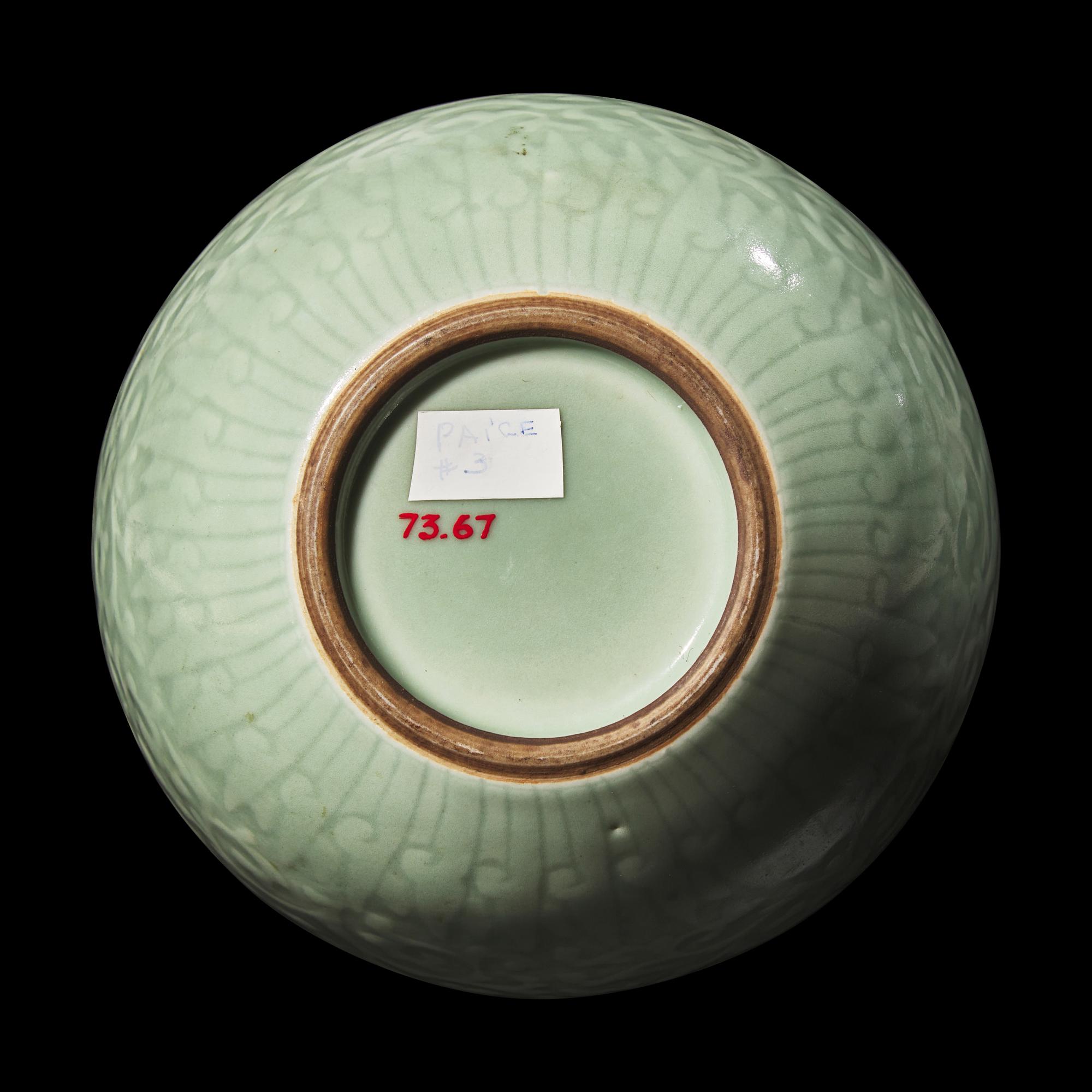 A Chinese Celadon Glazed Molded Porcelain Bottle Vase, Late Qing Dynasty 清晚期 粉青釉龍紋天球瓶