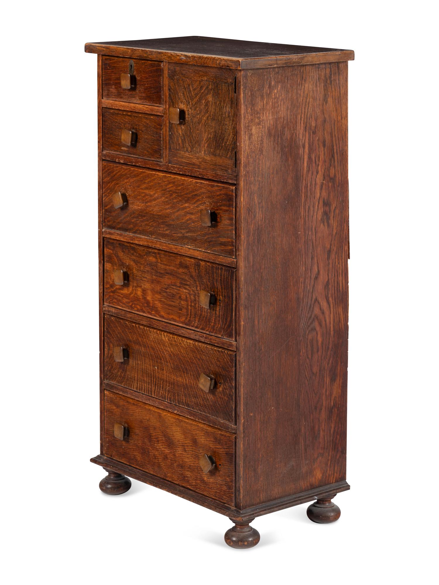 An Arts and Crafts Oak Chest of Drawers