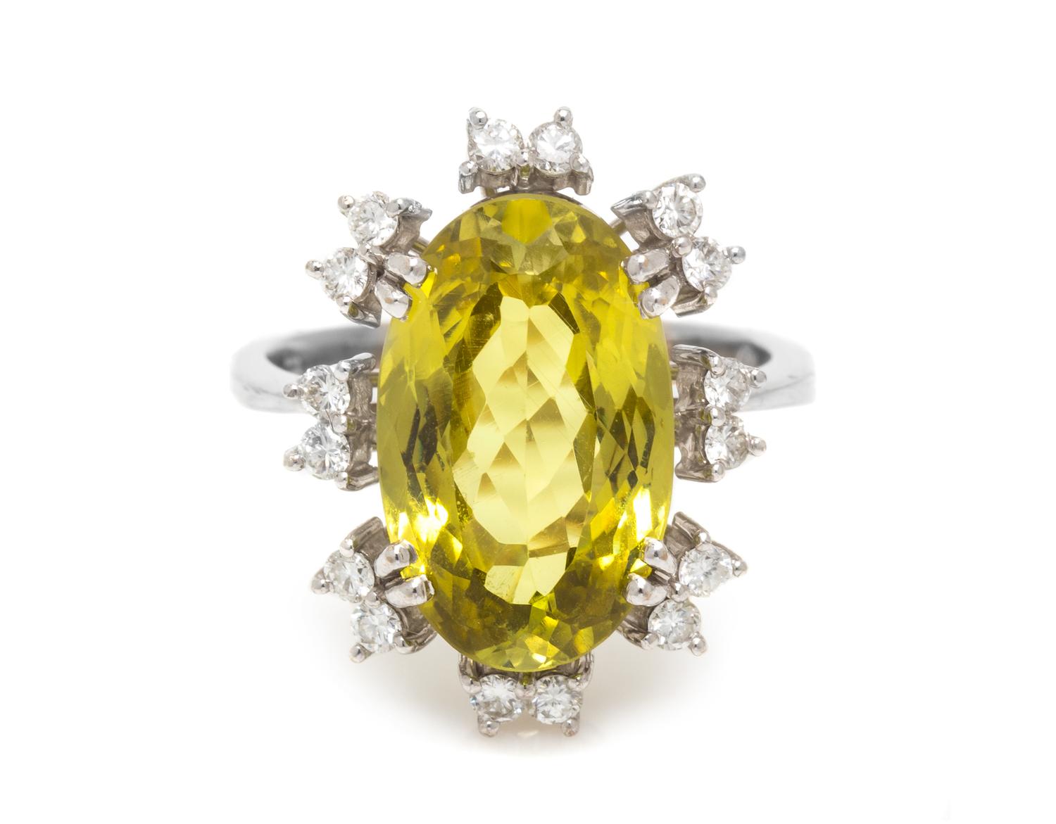 An 18 Karat White Gold, Chrysoberyl and Diamond Ring, 7.80 dwts.