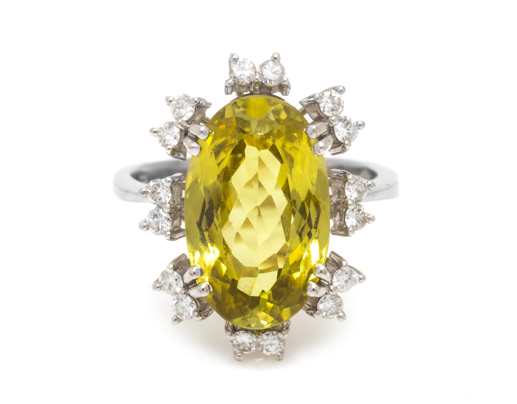 An 18 Karat White Gold, Chrysoberyl and Diamond Ring, 7.80 dwts.