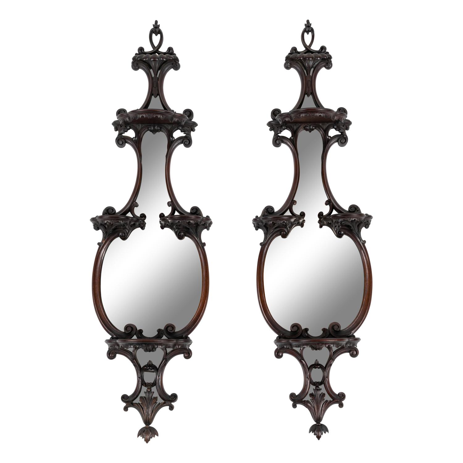 A Pair of George III Style Mirrored and Carved Mahogany Wall Brackets