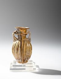 A Sidonian Yellow Glass Flask