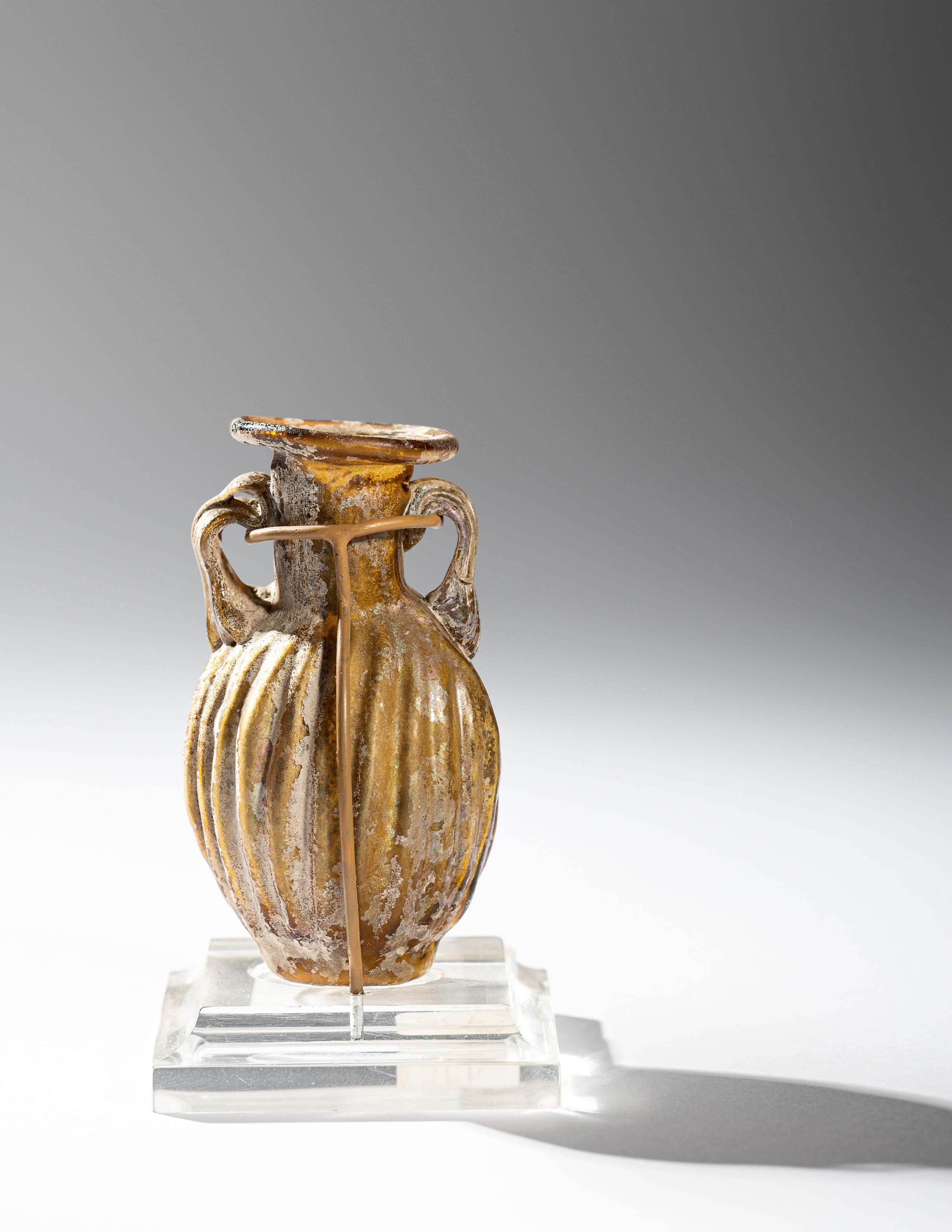 A Sidonian Yellow Glass Flask