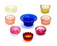 A Collection of Cut and Molded Glass Salts Diameter of largest 3 1/8 inches.