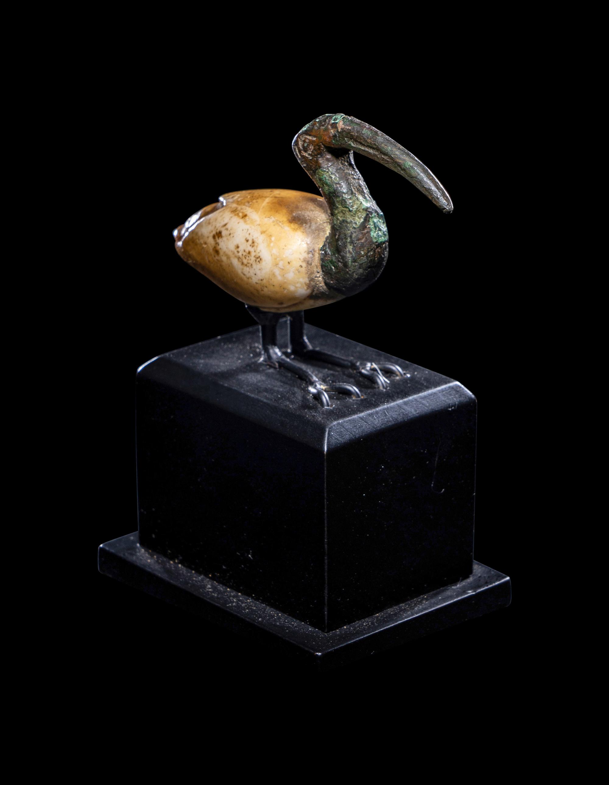 An Egyptian Bronze and Alabaster Ibis