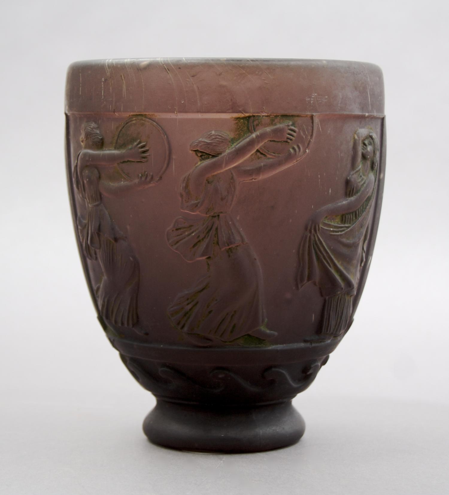 A Georges de Feure Molded Glass Vase, Height 5 5/8 inches.