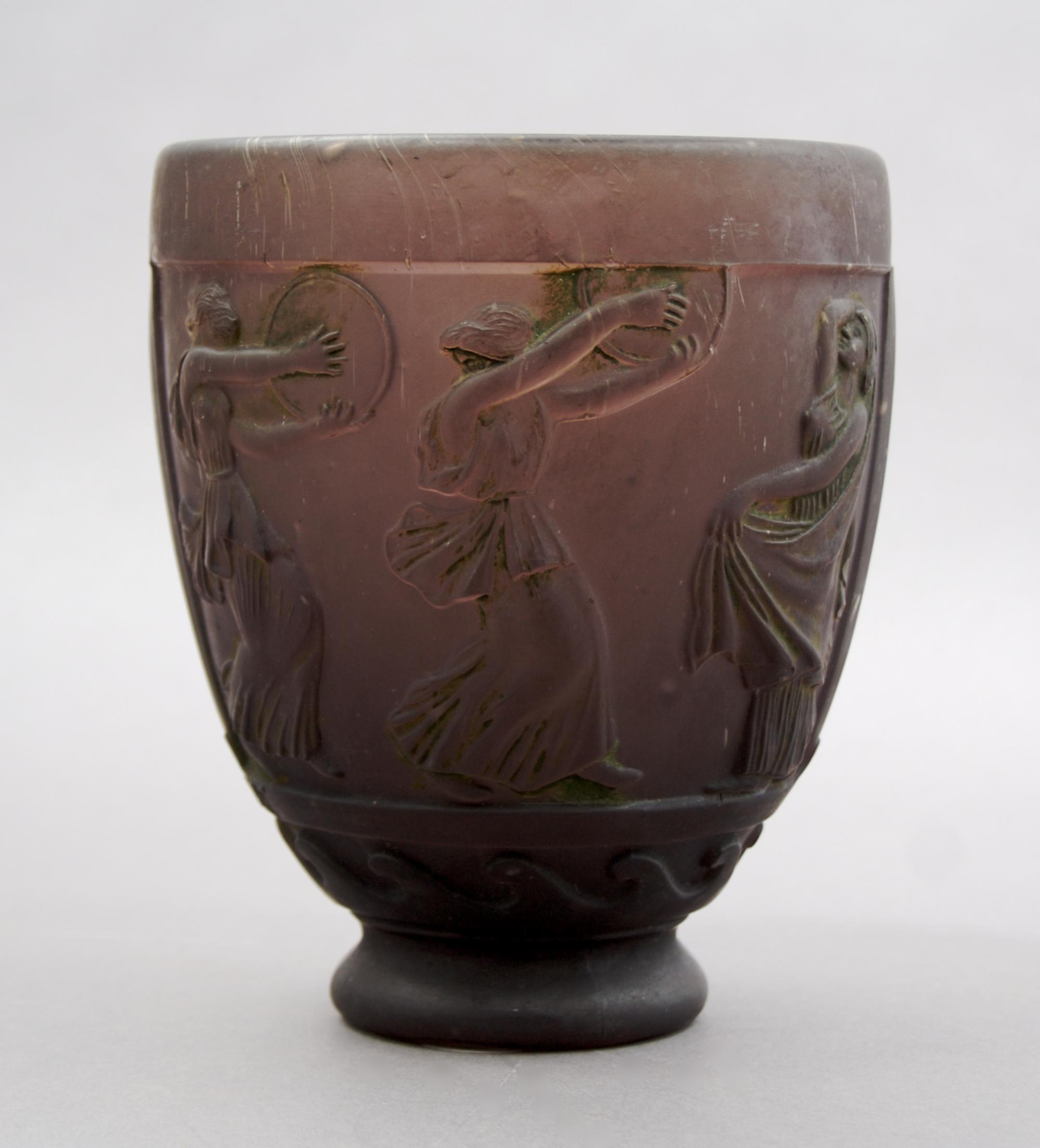 A Georges de Feure Molded Glass Vase, Height 5 5/8 inches.