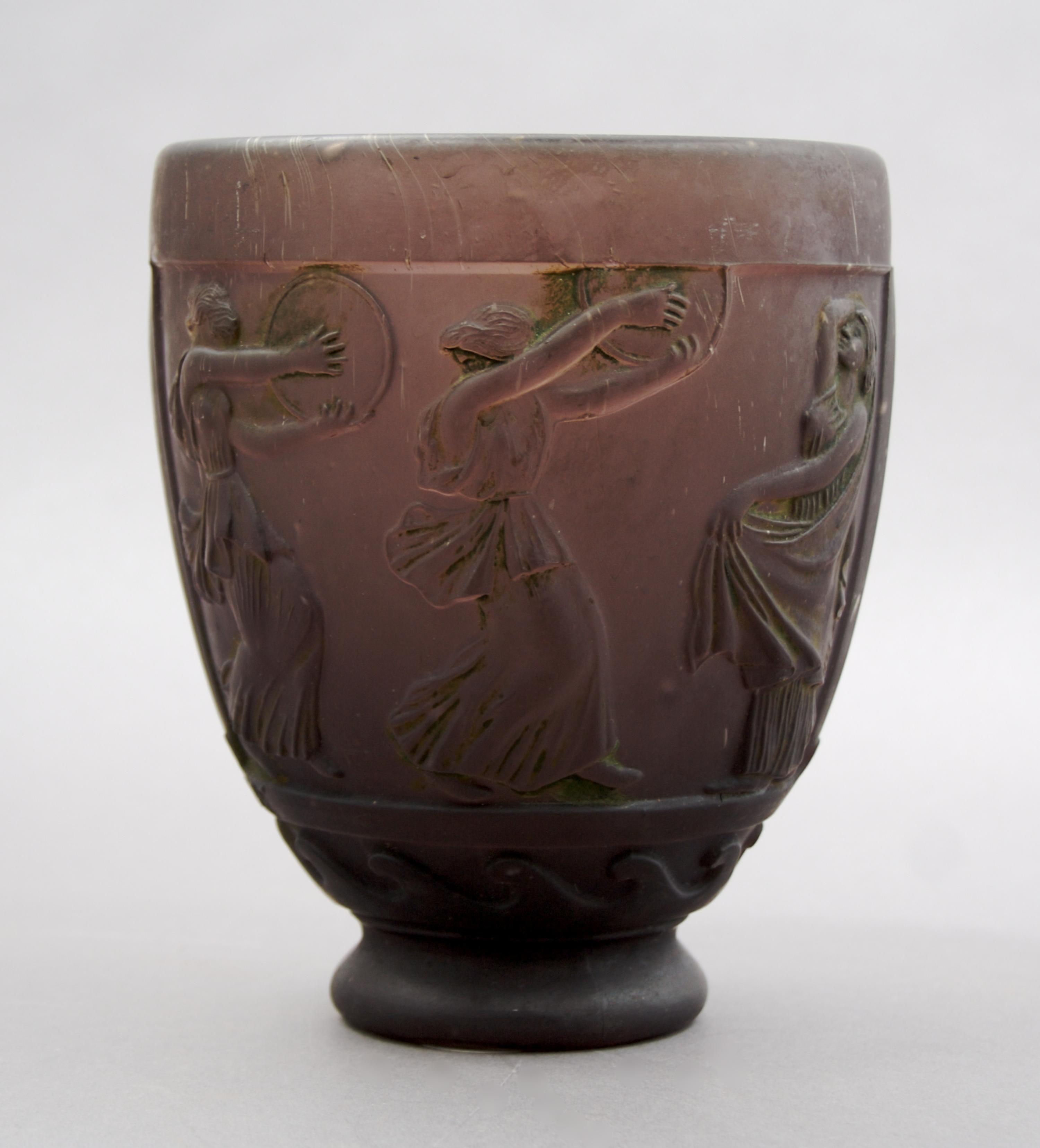 A Georges de Feure Molded Glass Vase, Height 5 5/8 inches.