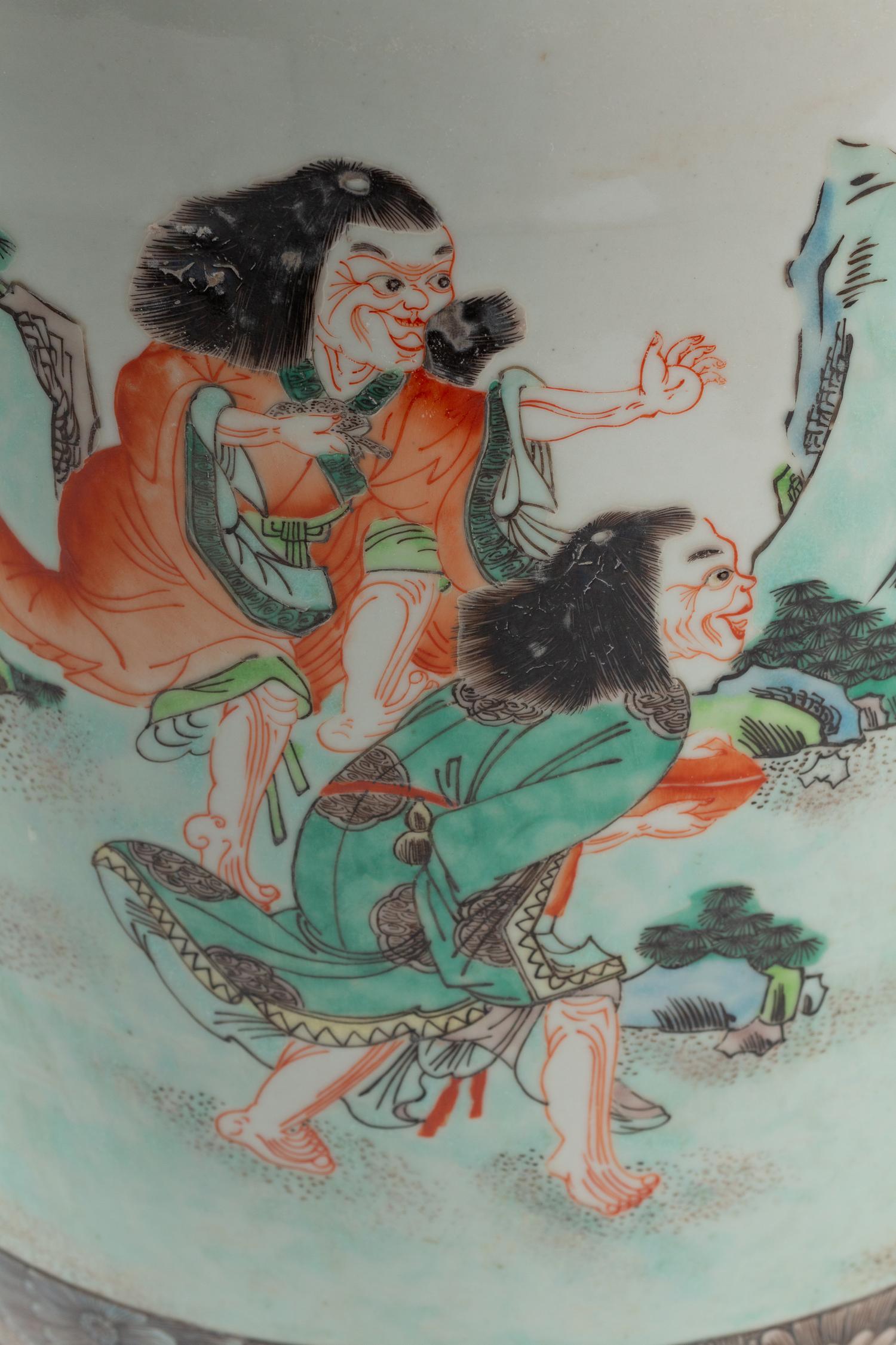 A Pair of Chinese Export Enameled Porcelain Vases on Carved Giltwood Bases