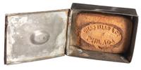 Civil War-period soap container with soap.