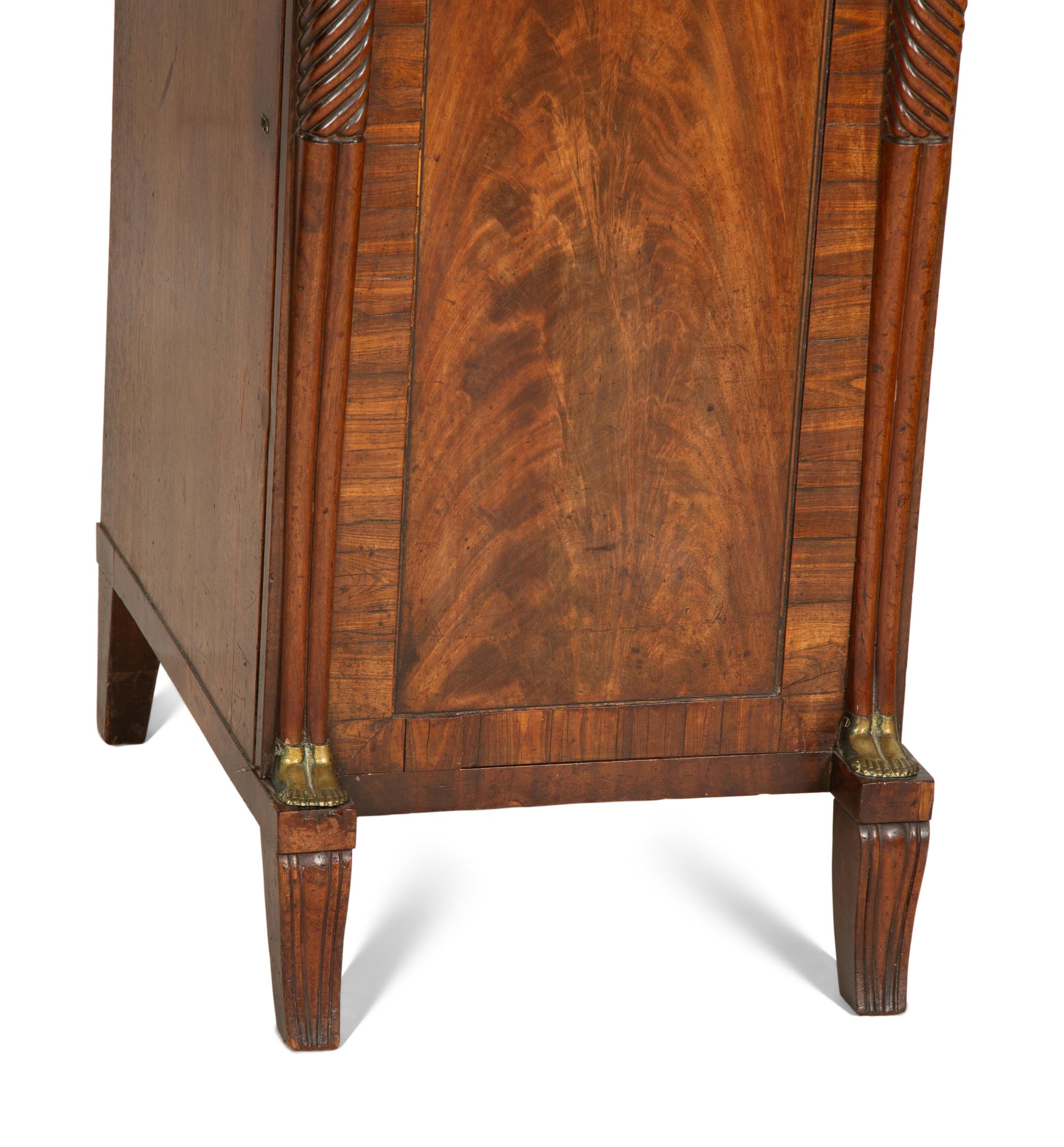 A Regency Gilt Bronze Mounted Mahogany Two-Pedestal Sideboard