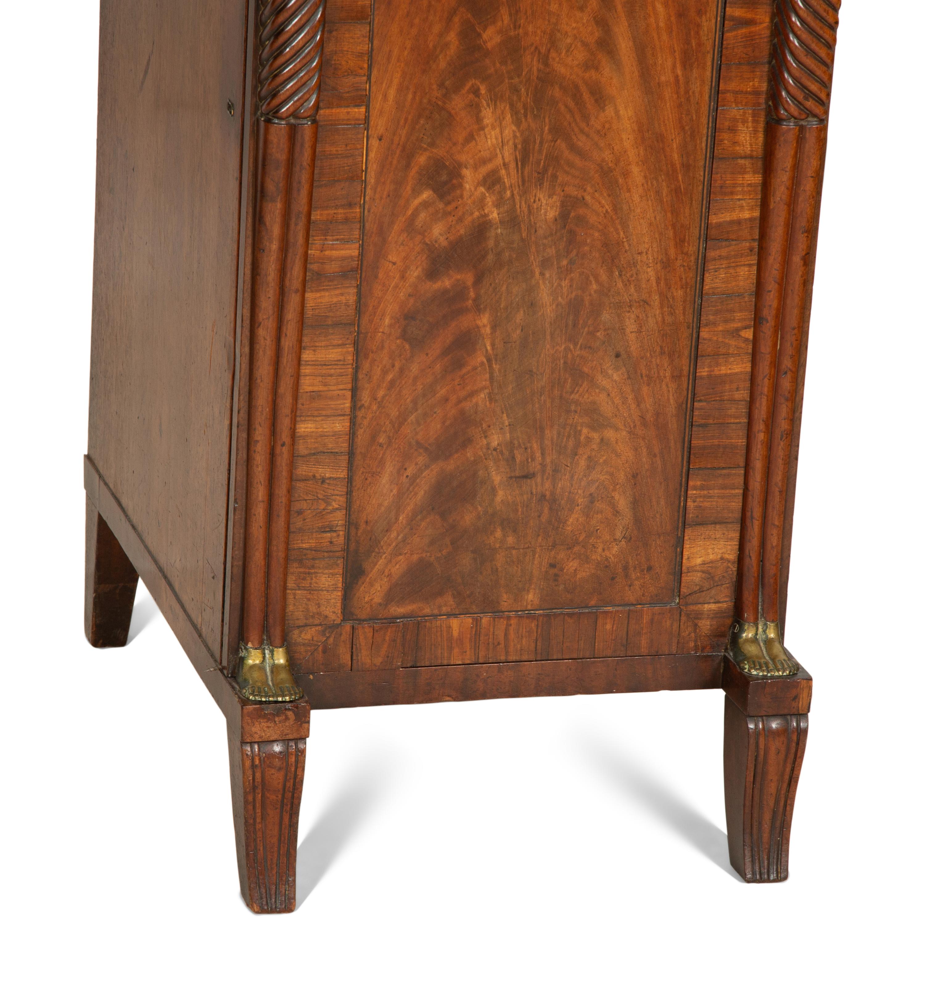 A Regency Gilt Bronze Mounted Mahogany Two-Pedestal Sideboard