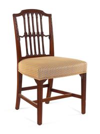 A Set of Six Regency Carved Mahogany Dining Chairs