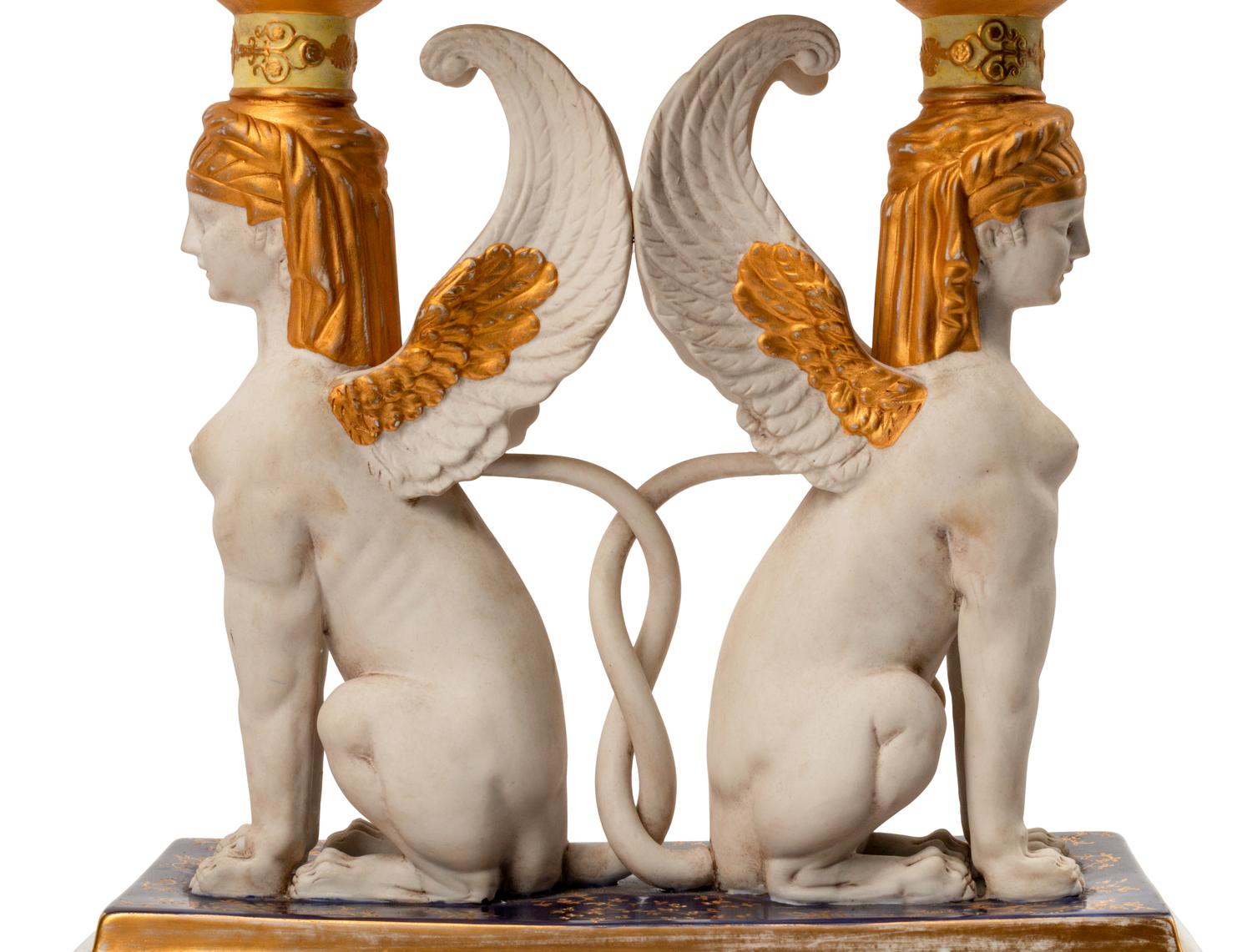 A Pair of Sevres Style Porcelain Figural Corbeilles