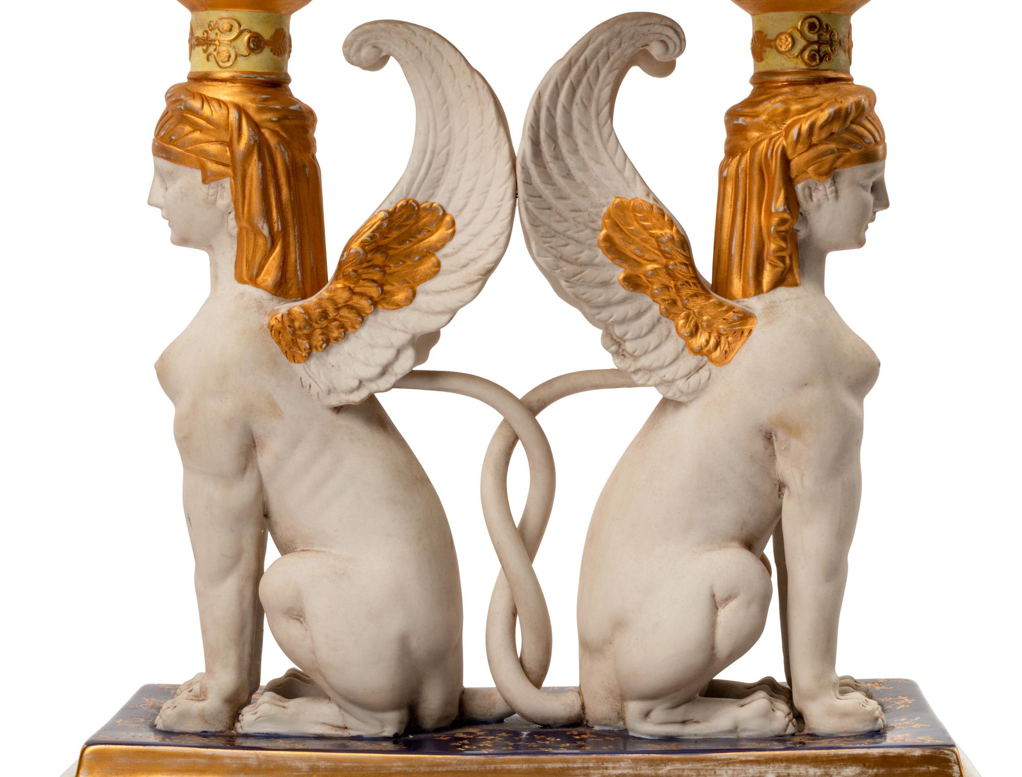 A Pair of Sevres Style Porcelain Figural Corbeilles