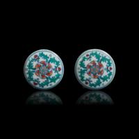 A Pair of Chinese Doucai Porcelain Scroll Caps 斗彩纏枝蓮紋軸頭