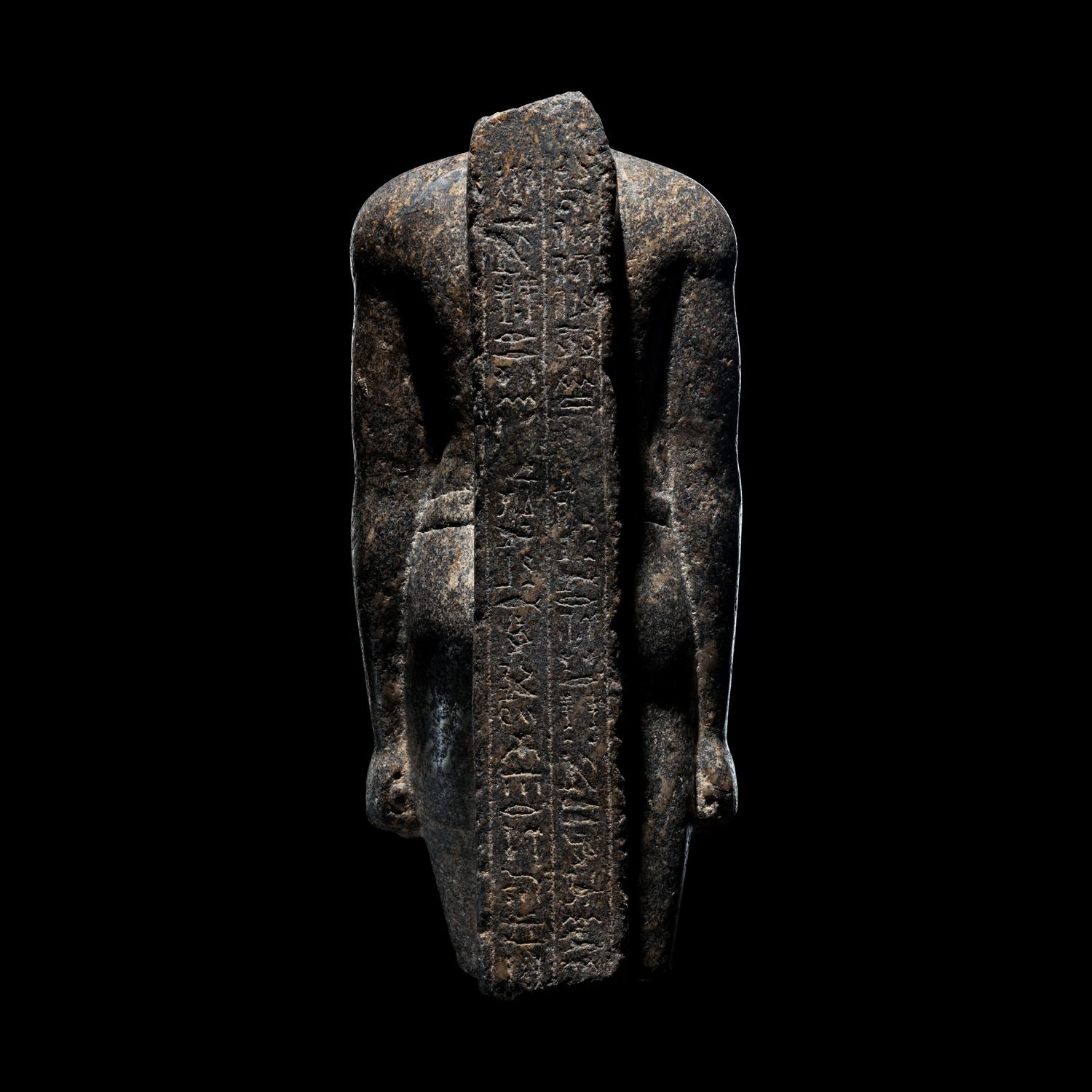 An Egyptian Granite Torso of an Official
