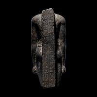 An Egyptian Granite Torso of an Official