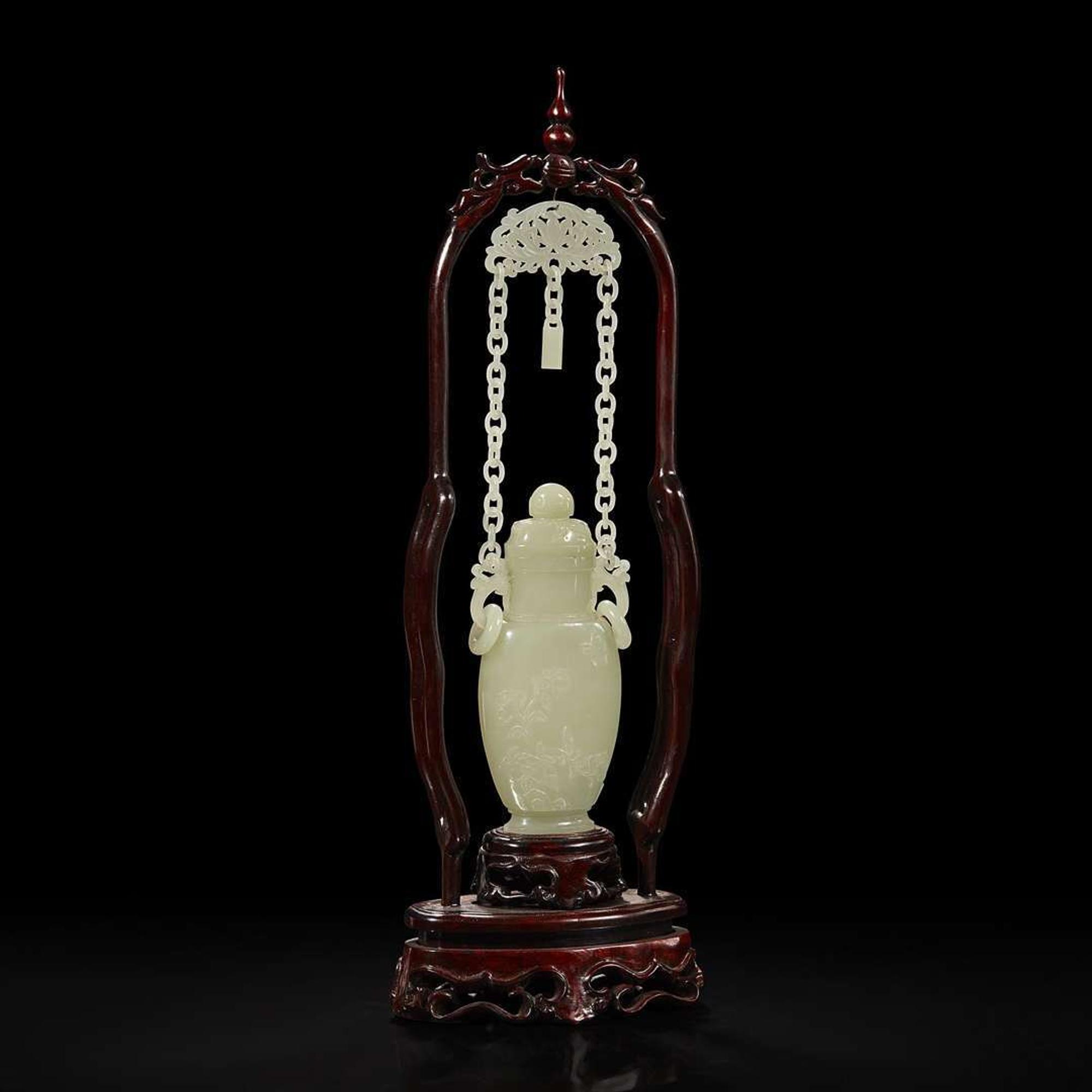 A Chinese pale celadon jade hanging vase and wood stand 白玉吊瓶