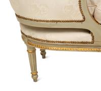 A French Provincial Style Painted and Parcel Gilt Chaise Longue