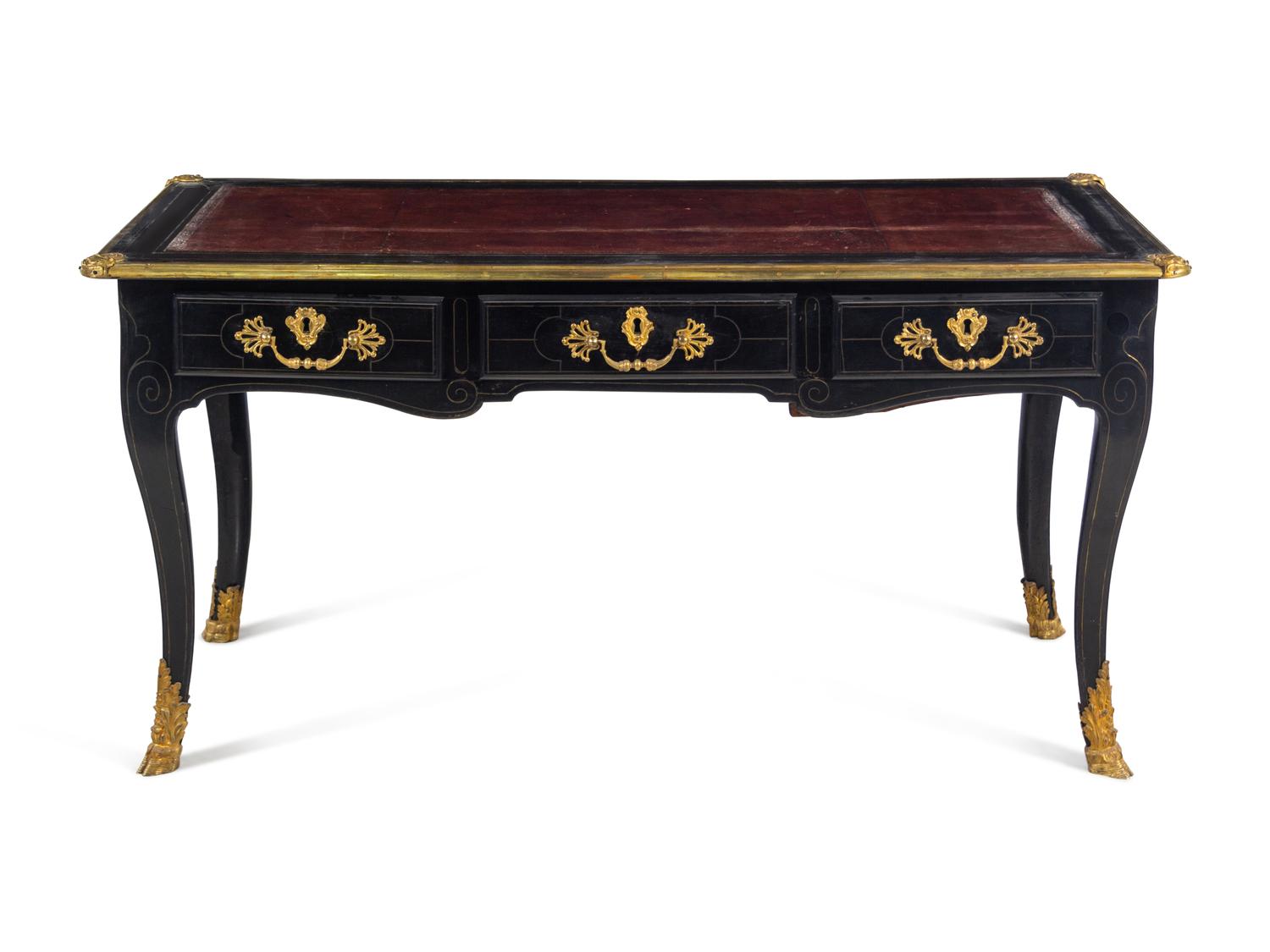 A Louis XV Gilt Bronze Mounted Brass Inlaid Ebonized Bureau Plat