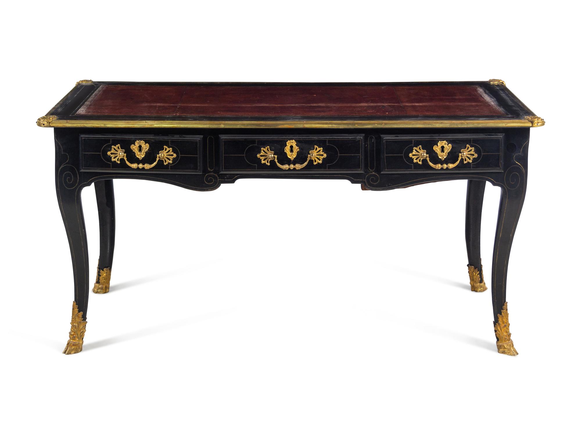 A Louis XV Gilt Bronze Mounted Brass Inlaid Ebonized Bureau Plat