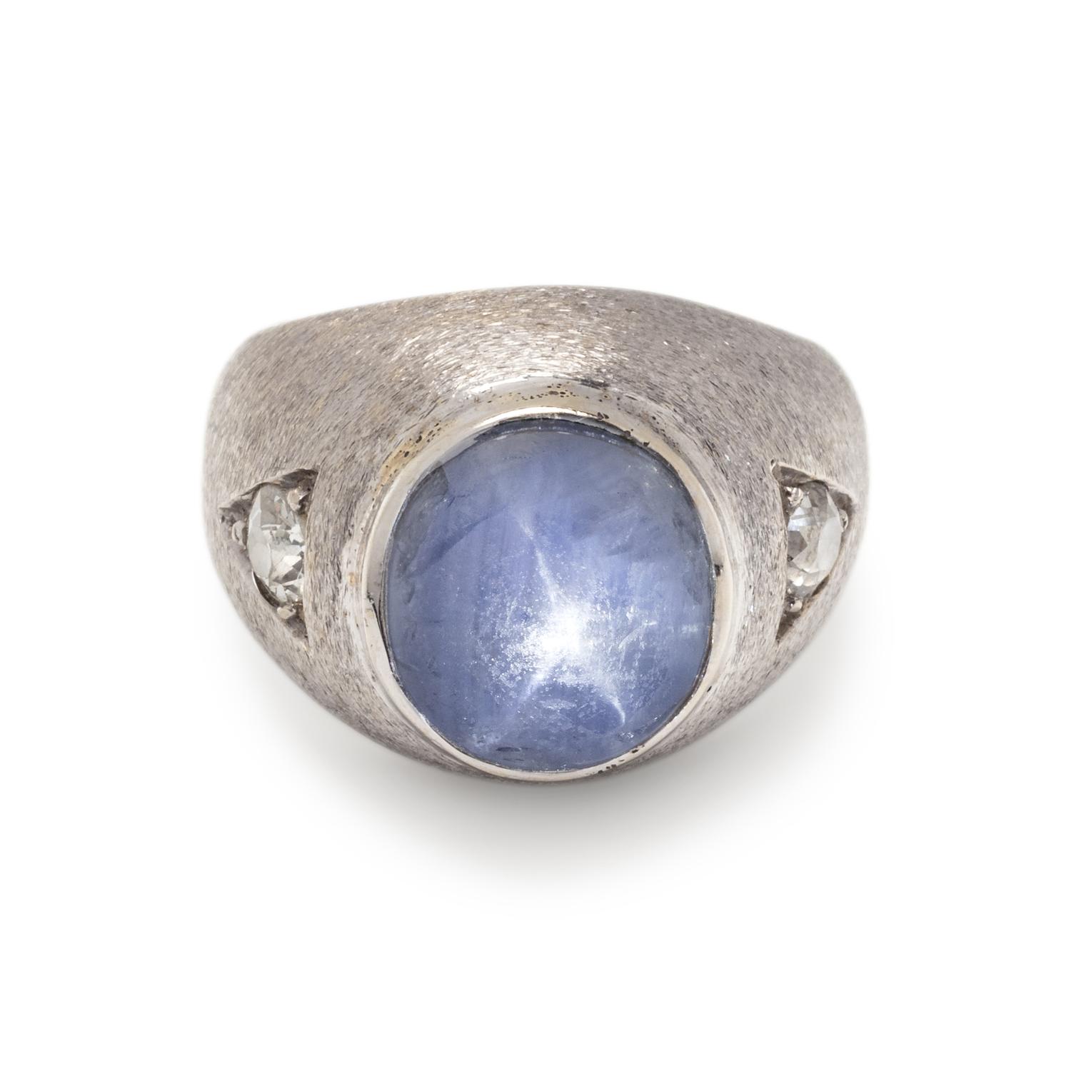 WHITE GOLD, STAR SAPPHIRE AND DIAMOND RING