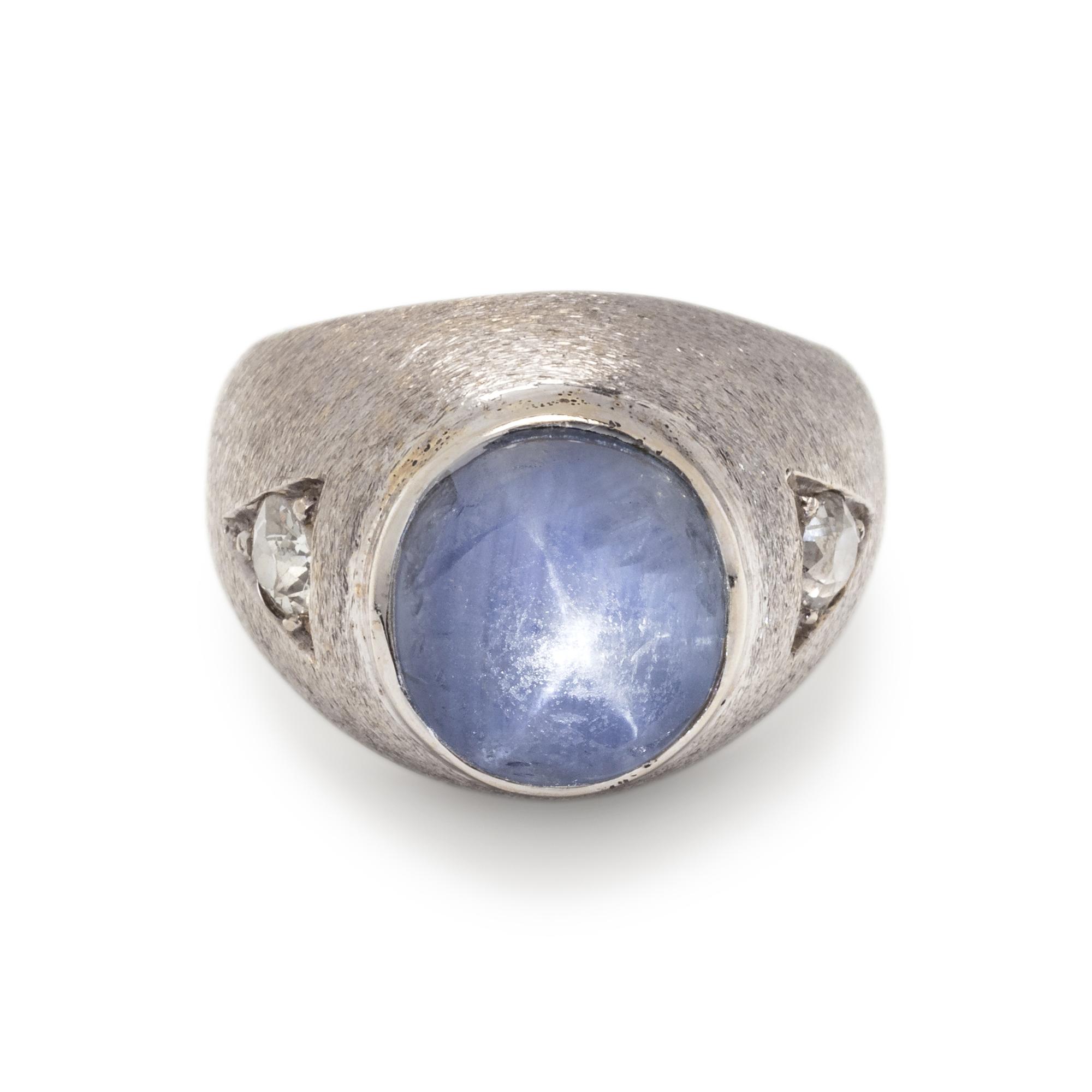 WHITE GOLD, STAR SAPPHIRE AND DIAMOND RING