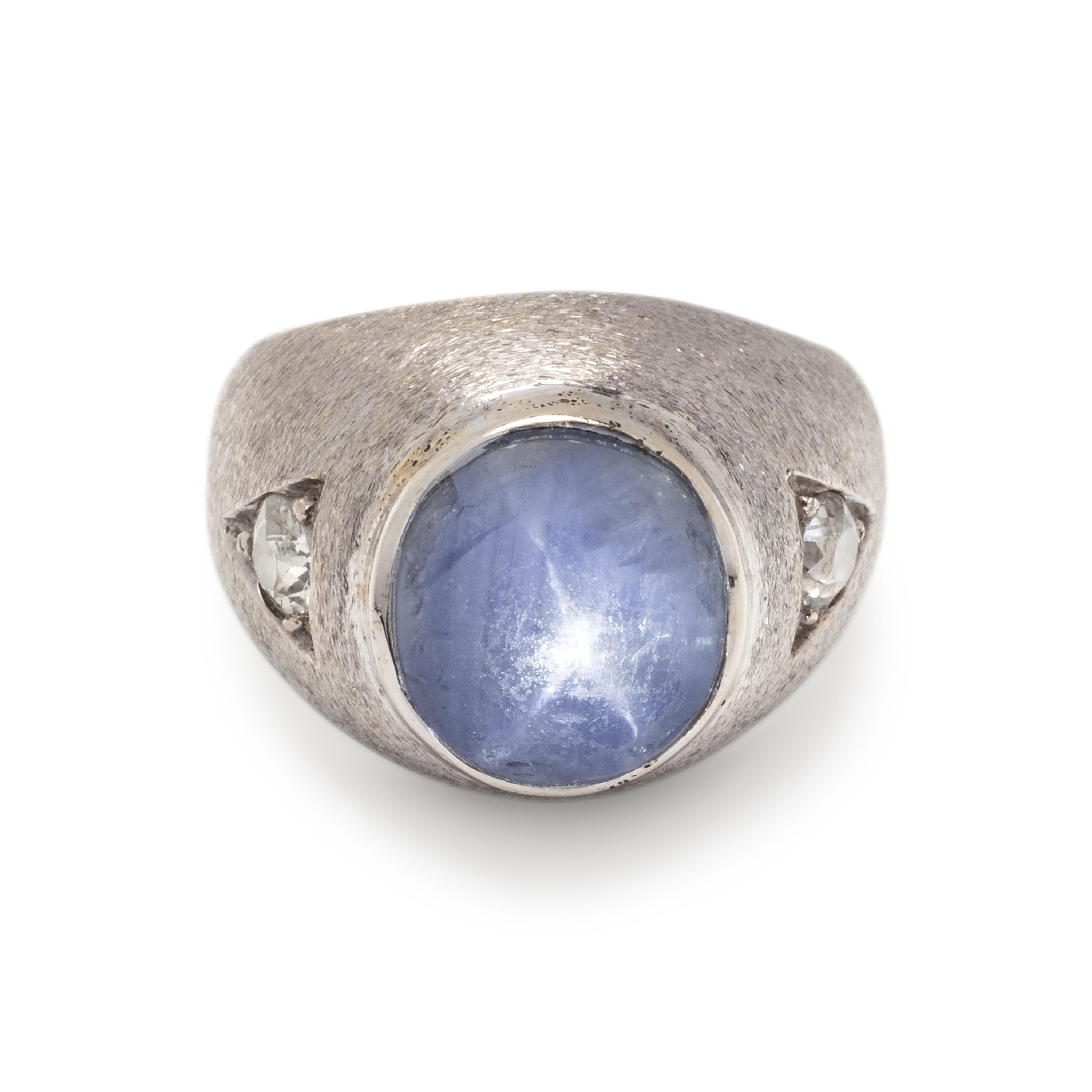 WHITE GOLD, STAR SAPPHIRE AND DIAMOND RING