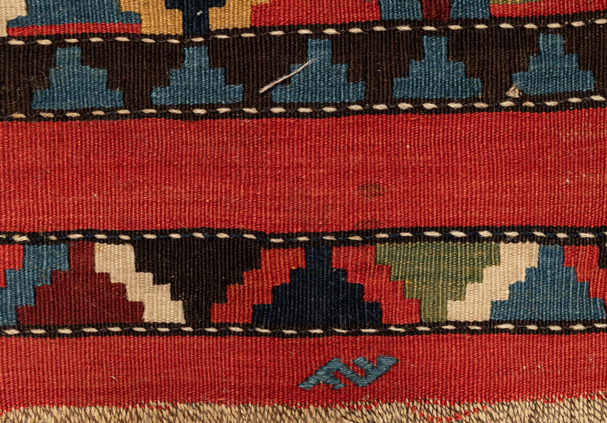 A Group of Three Kilim Rugs