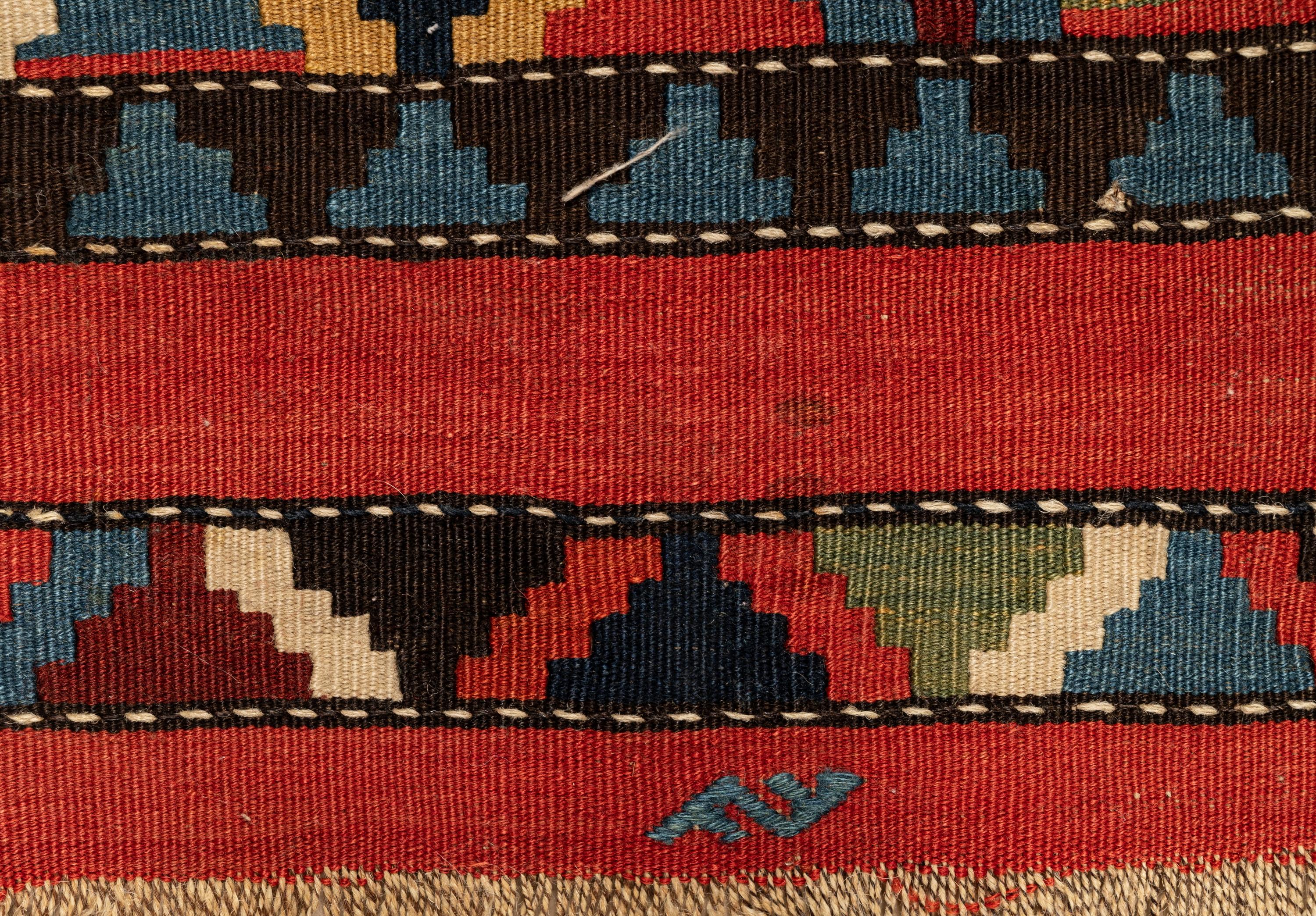A Group of Three Kilim Rugs