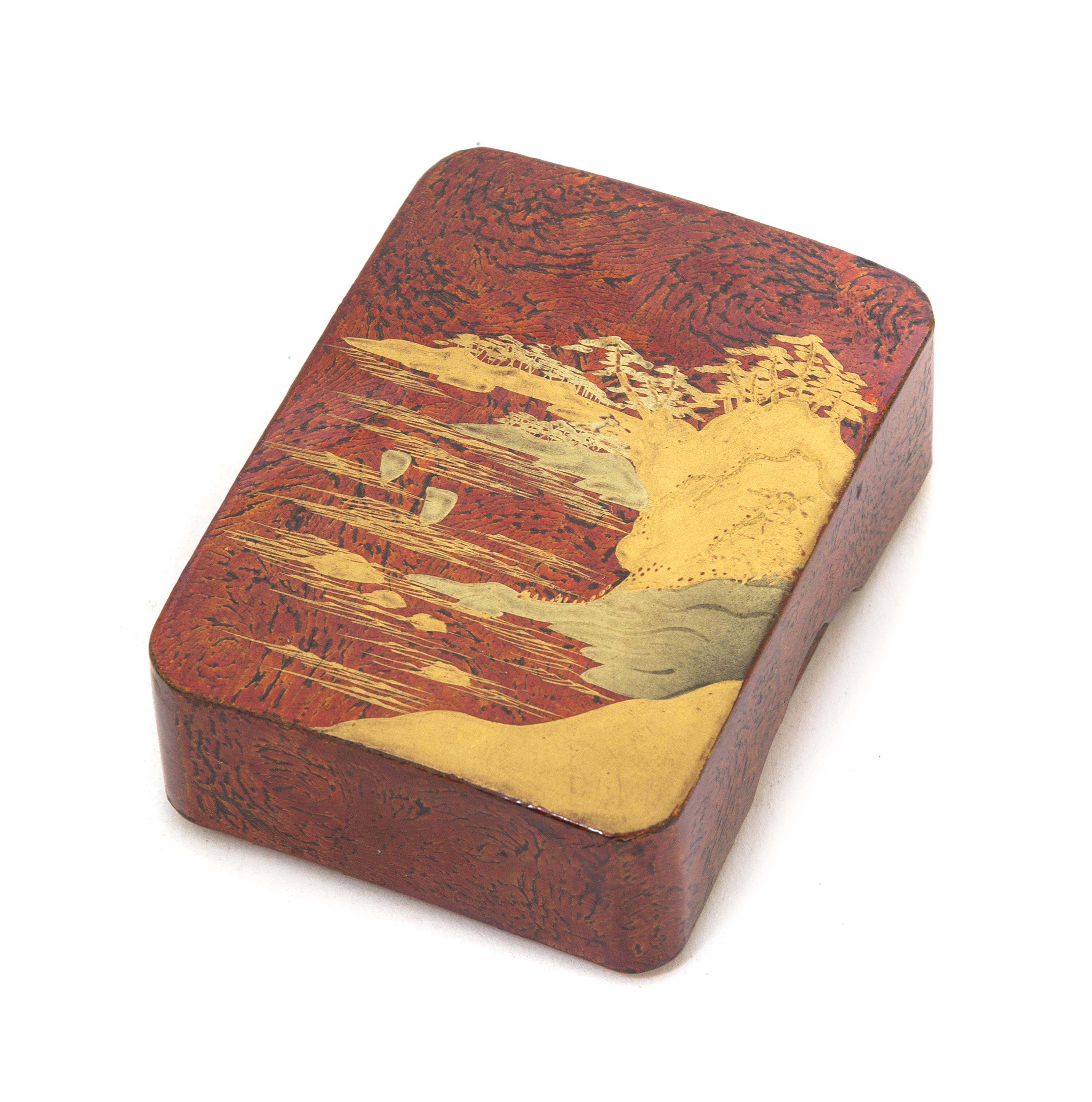 A Small Lacquer Box and Cover Length 3 1/2 inches.